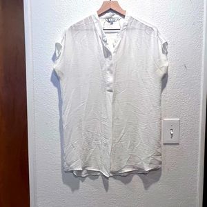 Loose fitting white blousy top